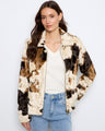 Stylish cow print jacket with a classic shirt collar, offering a chic twist on outerwear by Charlie B.