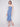 Blue garment suitable as both a skirt and a dress, featuring flowers by Charlie B.