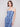 Floral pattern on versatile blue garment by Charlie B.