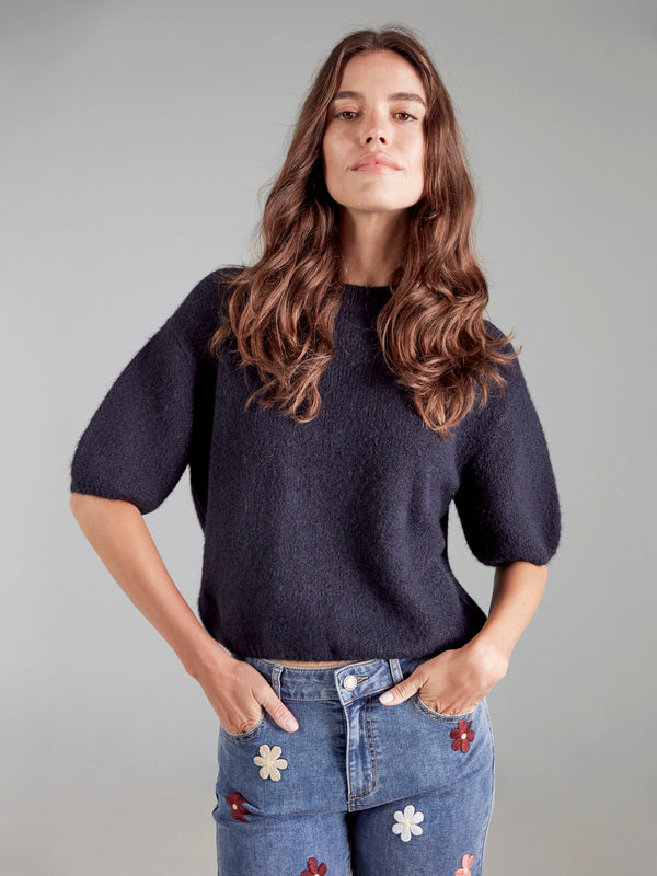Balloon-sleeved sweater crafted from soft fabric, delivering both comfort and style by Charlie B.