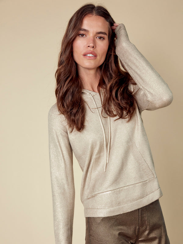 Shimmering metallic sheen gives this champagne knit hoodie an eye-catching finish, making it a standout piece by Charlie B.