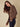 Elegant brown and black cardigan featuring a distinct bow tie closure by Charlie B.