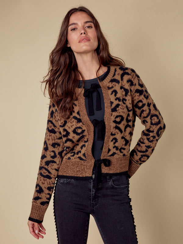 Fashion-forward animal print cardigan with cozy long sleeves by Charlie B.