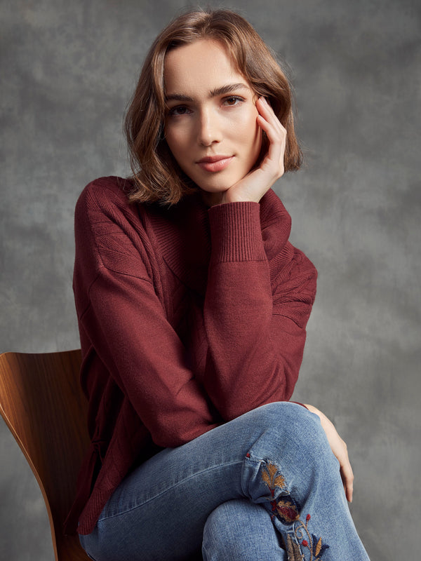 Stylish cabernet cowl neck sweater featuring elegant drop shoulders for added flair. By Charlie B.