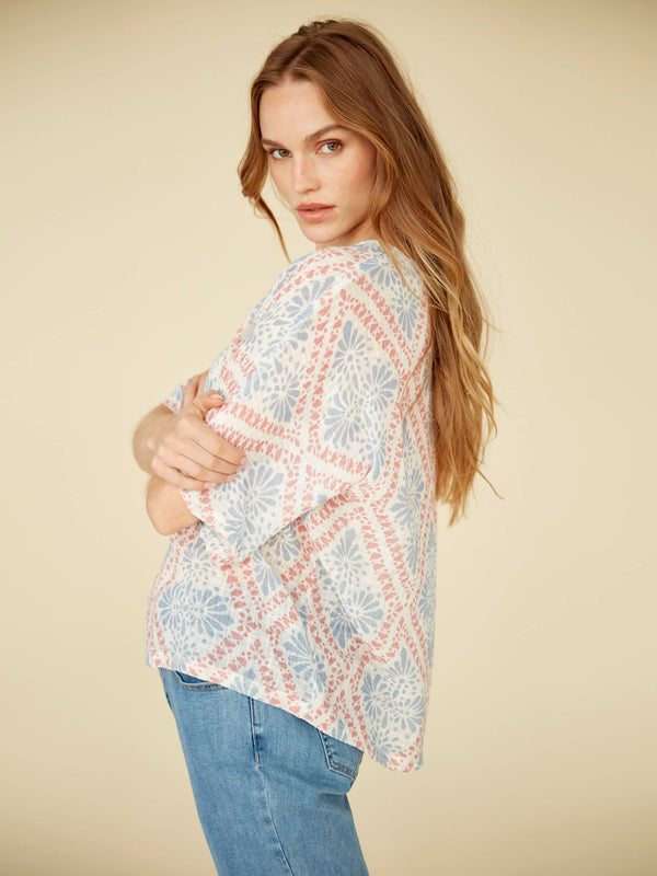 Stay comfortable yet stylish in this relaxed-fit top made of soft fabric, highlighted by its unique elbow-length dolman sleeves design. By Charlie B.