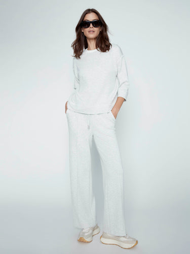 A blend of comfort and style, this garment's crew neckline offers a timeless appeal for your wardrobe essentials by Charlie B.