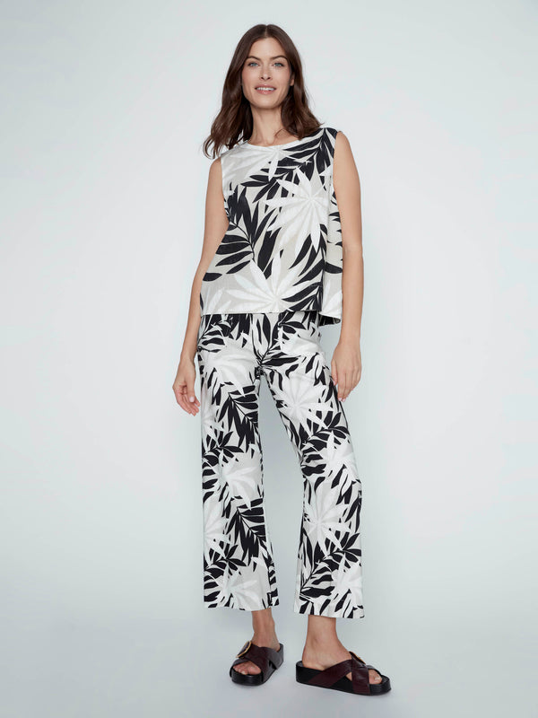 Relaxed fit tropical print top paired effortlessly with matching pants, creating an eye-catching ensemble. By Charlie B.