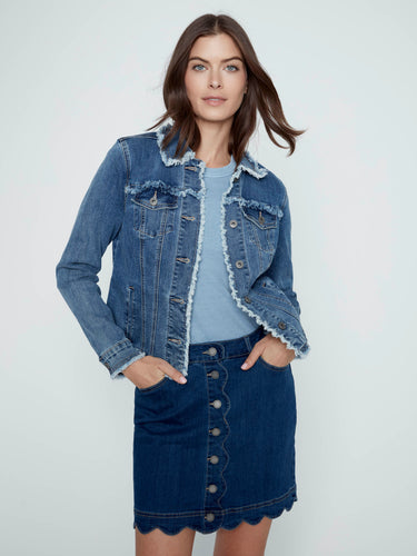 Casual look featuring an indigo denim skort adorned with front buttons, perfect for everyday outings by Charlie B.