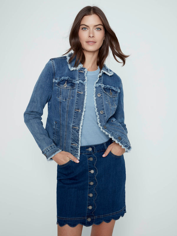 Casual look featuring an indigo denim skort adorned with front buttons, perfect for everyday outings by Charlie B.