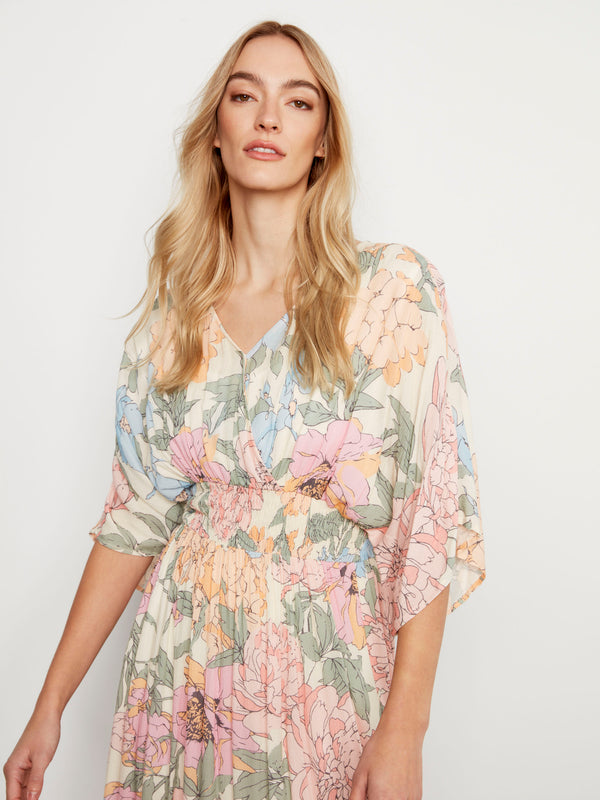Chic floral pattern adorns this ankle-length dress by Charlie B.