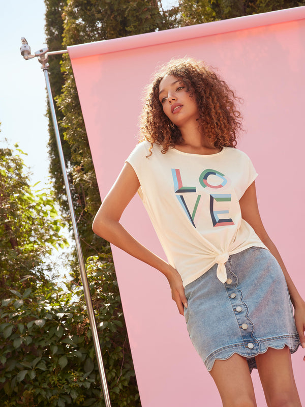 Functional pockets enhance the utility of this denim skort by Charlie B.