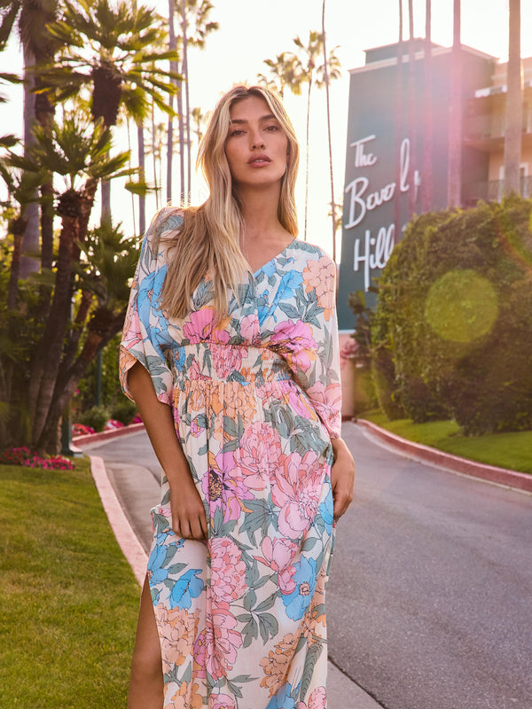 3/4 sleeve maxi dress showcasing a beautiful floral print, by Charlie B.