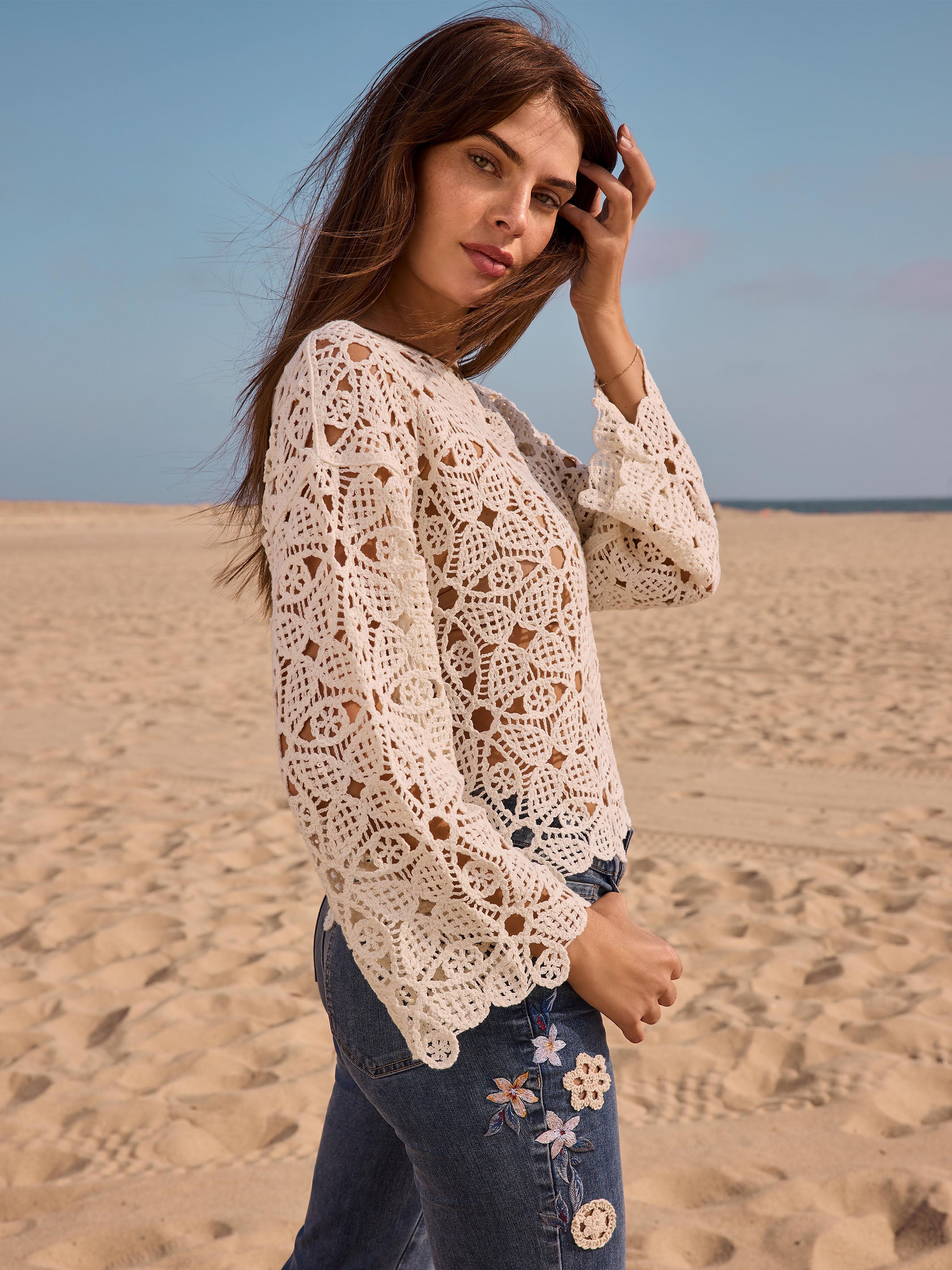 Versatile and elegant, this nature-toned crochet creation stands out by Charlie B.