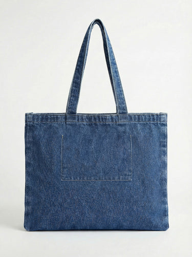Functional and fashionable denim bag with a handle height of 10" for easy carrying. Made by Charlie B.