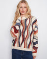Textured sweater with a classic crew neck, showcasing vibrant wave patterns for a bold look. By Charlie B.
