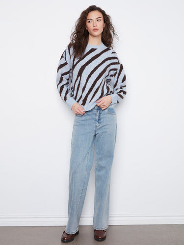 This sweater showcases drop shoulders, adding to its relaxed and comfortable vibe, perfect for casual wear by Charlie B.