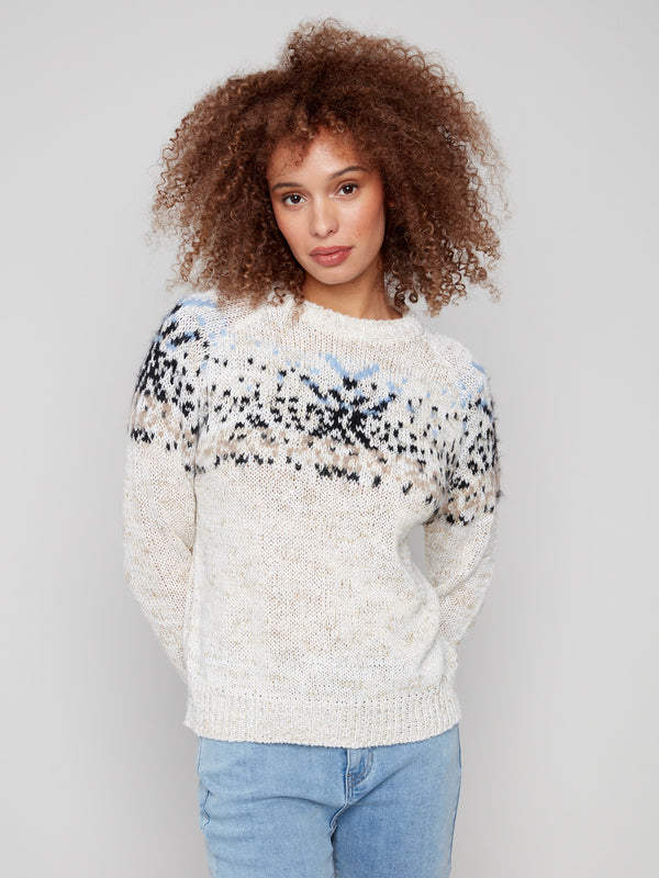 Ecru crew neck sweater showcasing a unique geometric pattern for added flair by Charlie B.