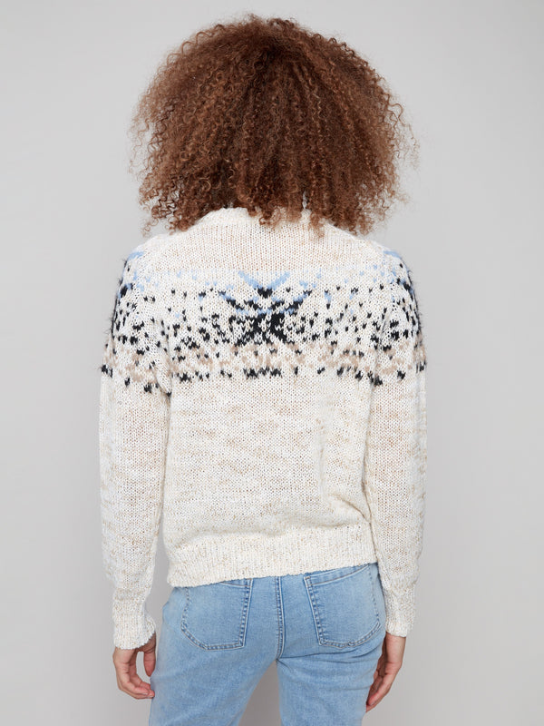 Stylish ecru sweater with raglan sleeves, perfect for casual outings or cozy days in by Charlie B.