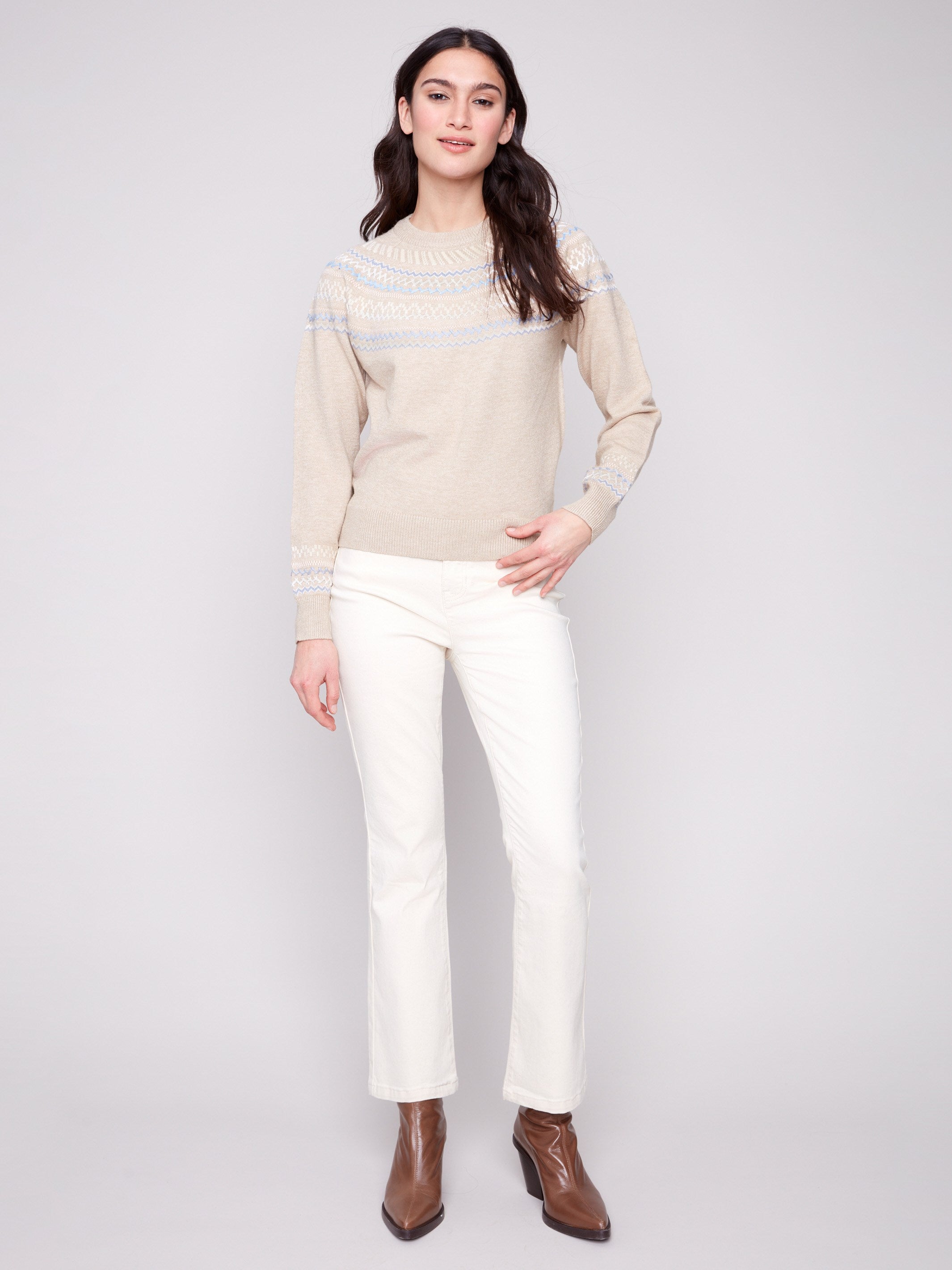 Elegant raglan sleeves enhance the geometric design of this heather oat jacquard sweater, offering comfort and style by Charlie B.