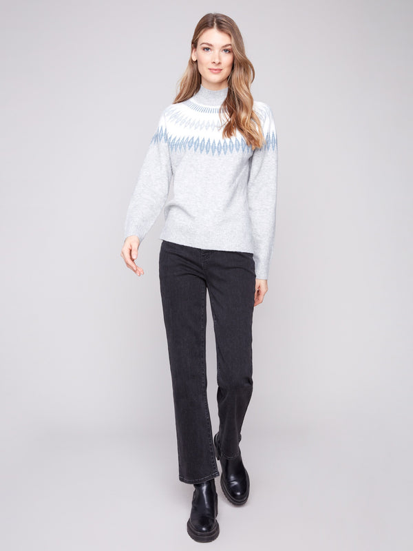 Light grey sweater with a geometric jacquard design, featuring raglan sleeves for added comfort by Charlie B.