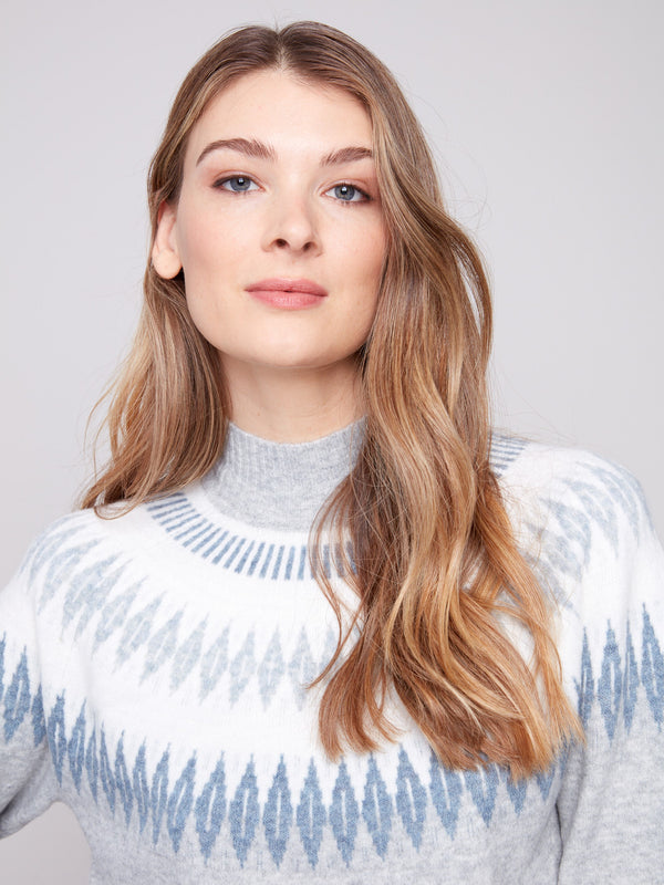 Sweater in heather light grey with a mock neck and intricate jacquard detail, offering a relaxed fit by Charlie B.