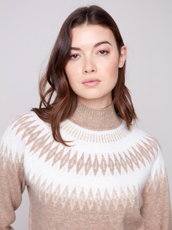 Chic geometric jacquard pattern on this heather beige sweater with comfortable raglan sleeves by Charlie B.
