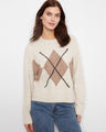 The sweater features a classic crew neckline, offering a timeless and versatile look by Charlie B.