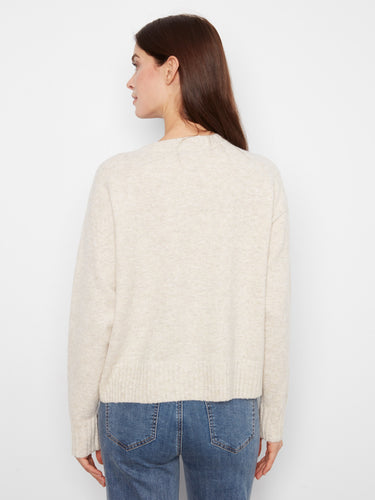 Whipstitch detail enhances the design with subtle texture and intricate craftsmanship by Charlie B.