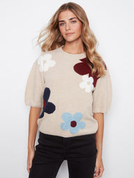 Cozy mock neck sweater with playful floral design, crafted from soft brushed knit for ultimate comfort by Charlie B.