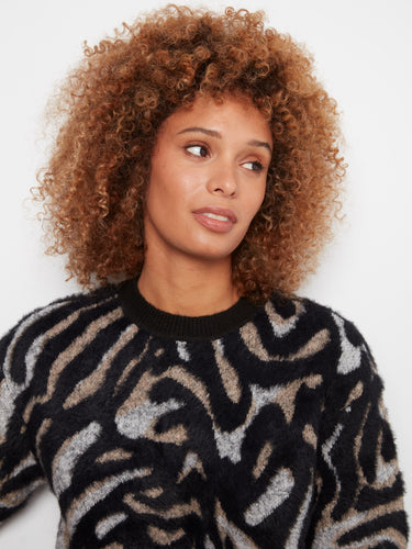 Experience the luxury of soft brushed knit with this chic sweater. Its design ensures comfort and style by Charlie B.