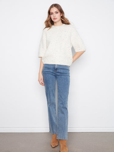 Chic speckled sweater with a relaxed fit and stylish balloon elbow sleeves, ideal for layering by Charlie B.
