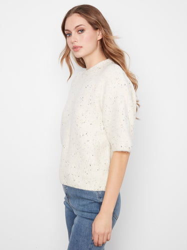 Stylish mock neck sweater crafted from soft brushed knit, offering both warmth and sophistication by Charlie B.