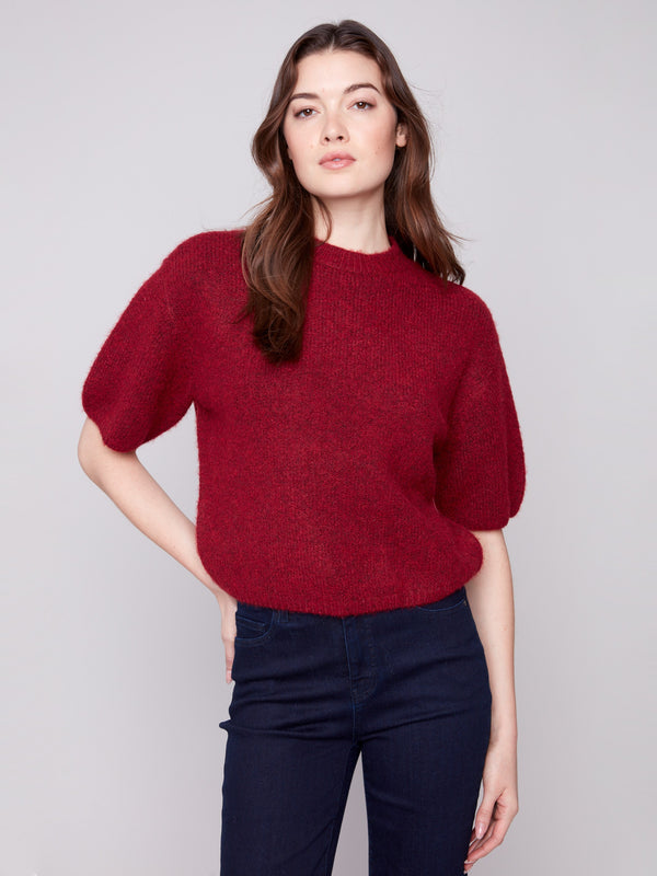 Cabernet knit sweater with plush texture and balloon-shaped elbow sleeves, offering a relaxed fit by Charlie B.