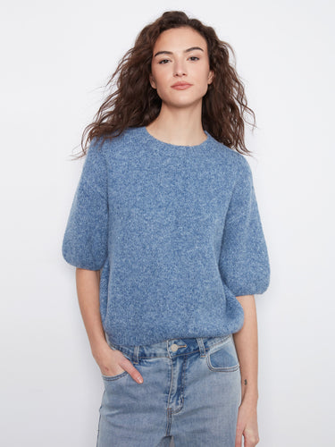 Elegant balloon elbow sleeves add flair to this cozy blue knit sweater by Charlie B.