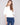 Ecru knit sweater featuring plush texture and balloon-shaped elbow sleeves, adding a touch of elegance to any outfit by Charlie B.