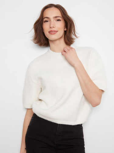 Relaxed fit design offers comfort and effortless elegance by Charlie B.