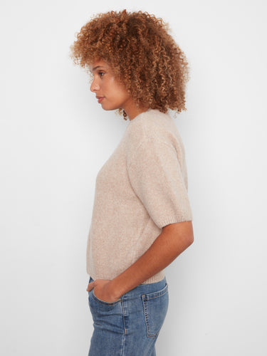 A versatile piece with a mock neck that complements various styles effortlessly. By Charlie B.