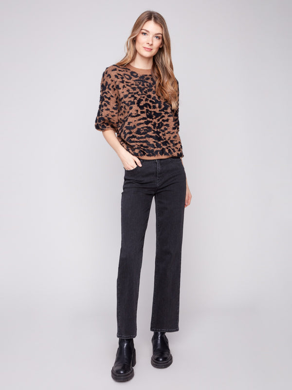 This relaxed fit leopard print sweater offers both style and ease for everyday wear by Charlie B.