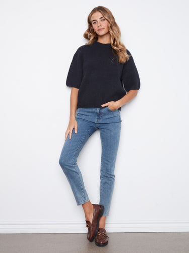 Crafted from soft brushed knit, this sweater offers warmth and comfort. Ideal for cozy days and nights by Charlie B.