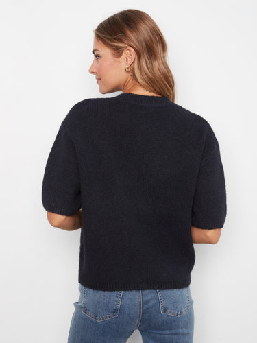 Enjoy the relaxed fit of this sweater, providing both comfort and style for everyday wear. Versatile fashion piece by Charlie B.