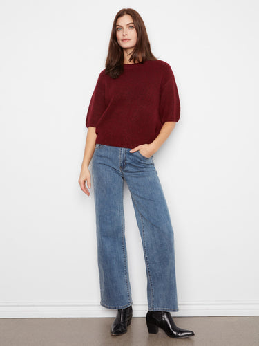 Crafted from soft brushed knit, this sweater ensures comfort and warmth. By Charlie B.
