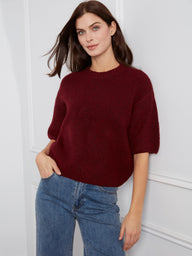 The balloon elbow sleeves on this sweater add a playful touch to its classic style. By Charlie B.