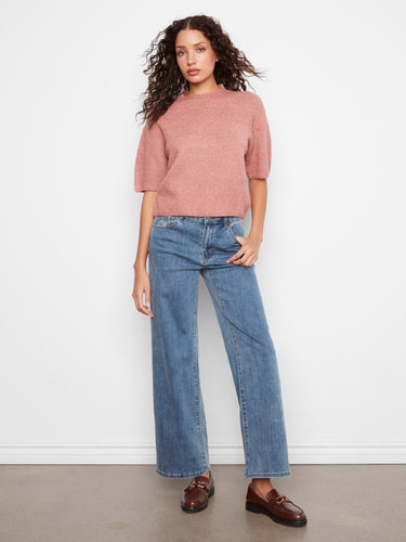 Crafted from soft brushed knit, this top offers comfort and style for everyday wear. Ideal for casual outings by Charlie B.