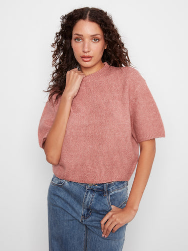 The balloon elbow sleeves give this top a unique touch, making it a standout piece in your wardrobe by Charlie B.