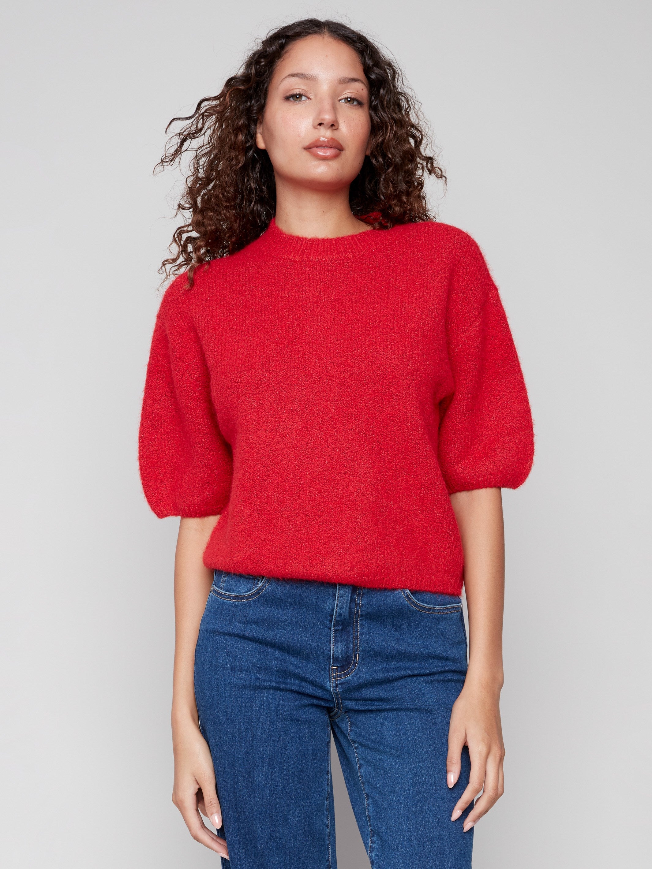 Crimson sweater featuring balloon-shaped elbow sleeves and a relaxed fit, perfect for casual wear by Charlie B.
