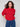 Soft knit sweater in crimson with a crew neckline, offering a plush texture and cozy feel by Charlie B.