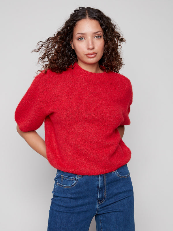 Soft knit sweater in crimson with a crew neckline, offering a plush texture and cozy feel by Charlie B.