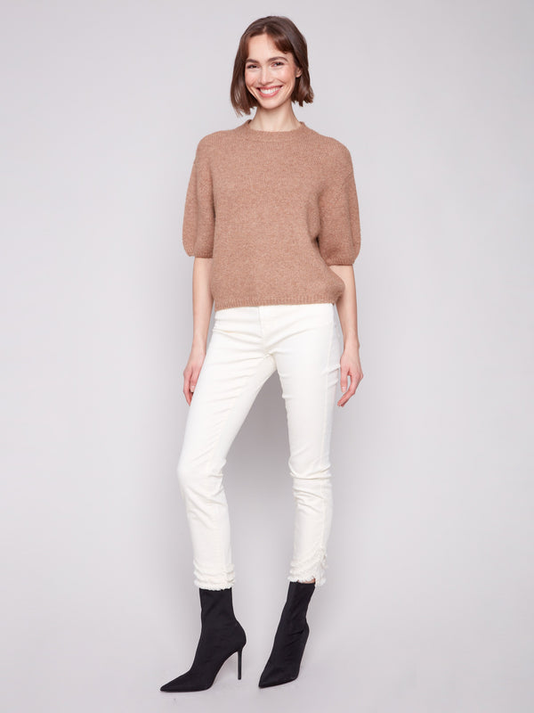 Elegant sesame sweater with a relaxed fit and crew neckline, offering both style and ease by Charlie B.