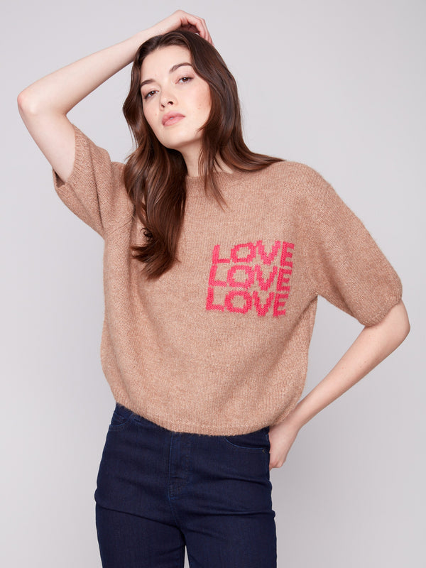Knit sweater in truffle with a relaxed fit and 'LOVE' graphic, perfect for casual comfort by Charlie B.