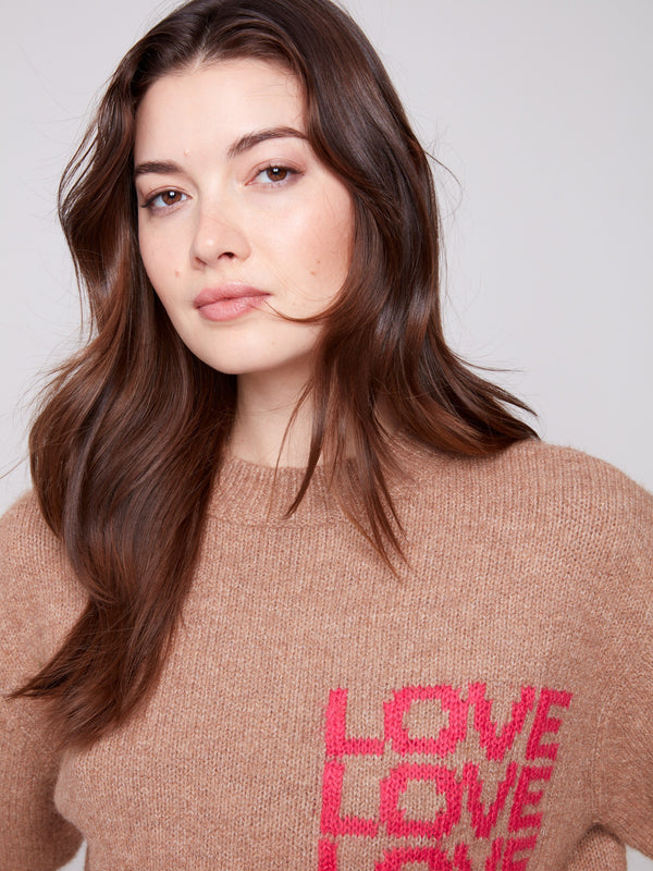 Soft plush knit sweater in truffle with unique balloon-shaped sleeves and 'LOVE' text by Charlie B.